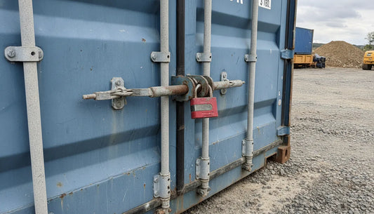 Heavy-duty lock securing shipping container doors